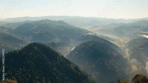 Great view of the mountains in autumn. Pieniny Mountains. View from the Trzy Korony peak. The Dunajec River Valley. Limestone rocks. Sunny day. Sromowce Nizne, Poland photo