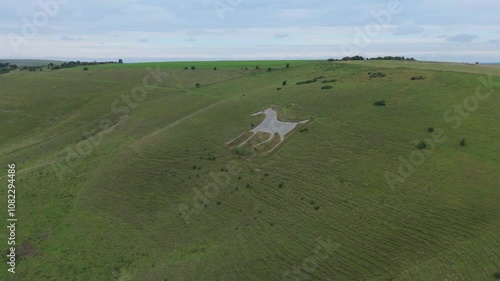 Alton Barnes, Wiltshire, UK, September 07, 2024; Aerial distance orbit clip of the chalk landmark Alton Barnes White Horse, near Alton Barnes, Wiltshire, England, UK photo