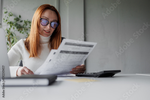 Businesswoman Analyzing Documents