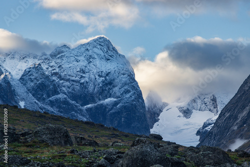 View of Ulamertorsuaq mountain and the view of surrounding mountains and glaciers in Tasermiut fjord (South Greenland) photo