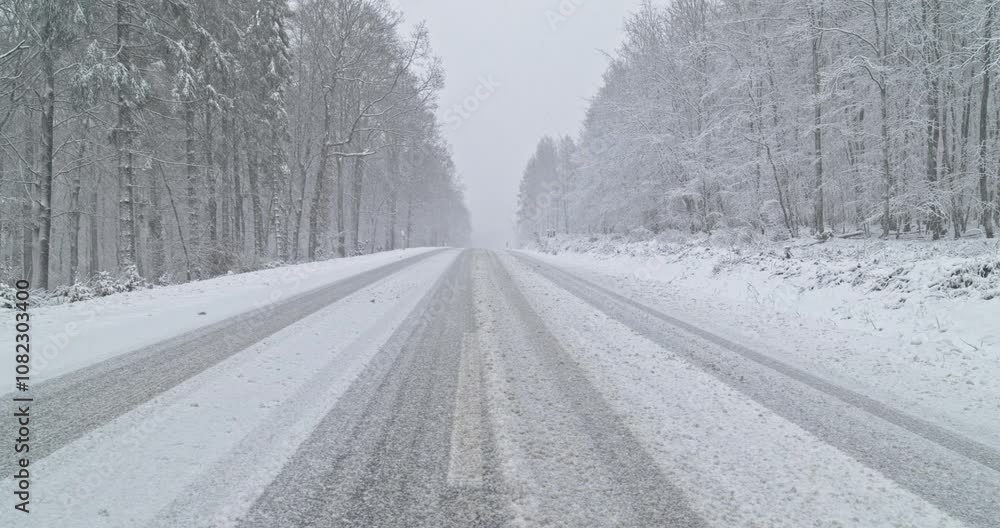 Snowy Winter Roads - Heavy snowfall on a mountain road - Lockdown shot