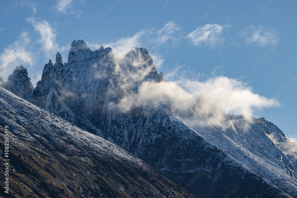 View of Ulamertorsuaq mountain and the view of surrounding mountains and glaciers in Tasermiut fjord (South Greenland) View of Ulamertorsuaq mountain and the view of surrounding mountains and glaciers in Tasermiut fjord (South Greenland)