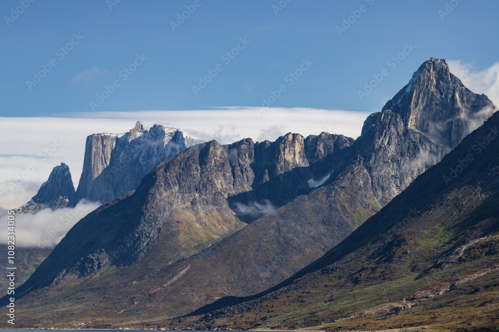 View of Ulamertorsuaq mountain and the view of surrounding mountains and glaciers in Tasermiut fjord (South Greenland) View of Ulamertorsuaq mountain and the view of surrounding mountains and glaciers in Tasermiut fjord (South Greenland)