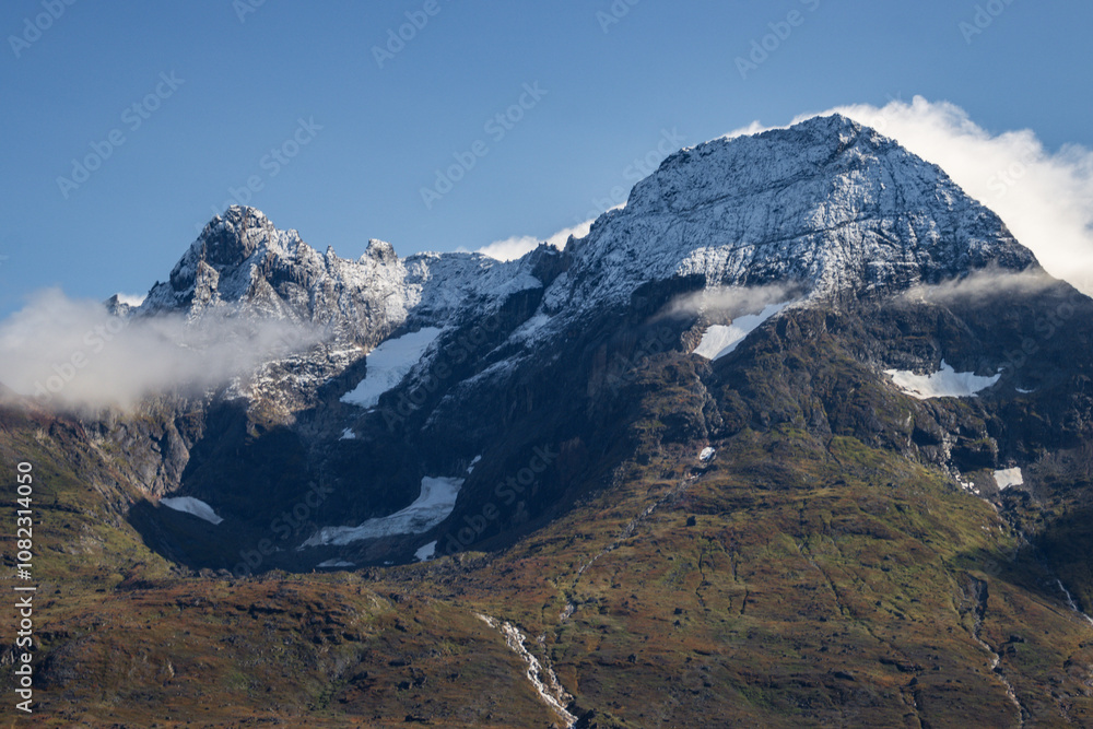 View of Ulamertorsuaq mountain and the view of surrounding mountains and glaciers in Tasermiut fjord (South Greenland) View of Ulamertorsuaq mountain and the view of surrounding mountains and glaciers in Tasermiut fjord (South Greenland)