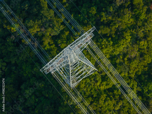 Aerial view of high voltage electricity tower on mountain