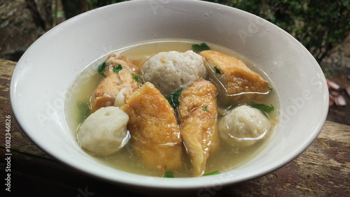 bakso tahu kuah or tofu meatballs with sauce. Typical West Javanese Indonesian food is usually served warm. made from chicken or beef and flour. meatball soup