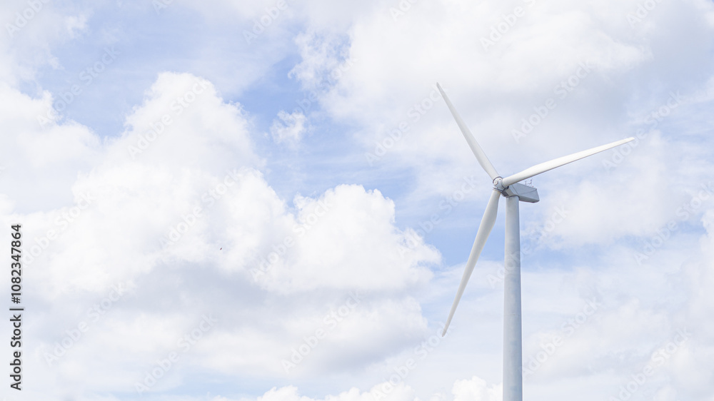 Wind turbines with white clouds sky, conservation concept. Natural energy with free space for text. Wind turbines with white clouds sky, conservation concept. Natural energy with free space for text.