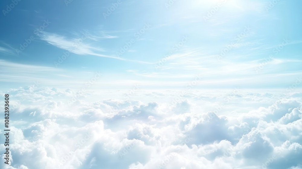A serene sky filled with soft, fluffy clouds under a bright blue atmosphere.