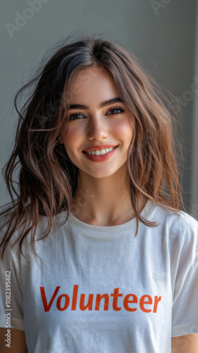 Young woman exuding joy in a volunteer t-shirt, emanating happiness and compassion, embodying the essence of community service photo