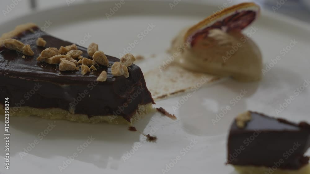 Slices of brownie and some other sweet dish in a white plate Slices of brownie and some other sweet dish in a white plate