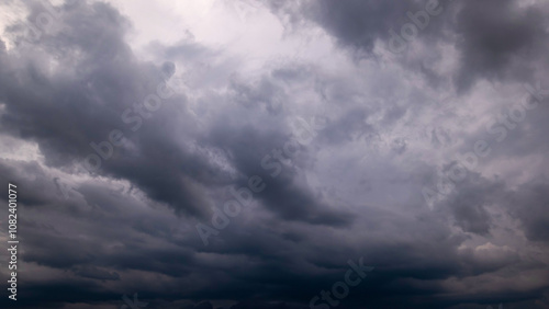  Dark sky with stormy clouds. Dramatic sky rain,Dark clouds before a thunder-storm.