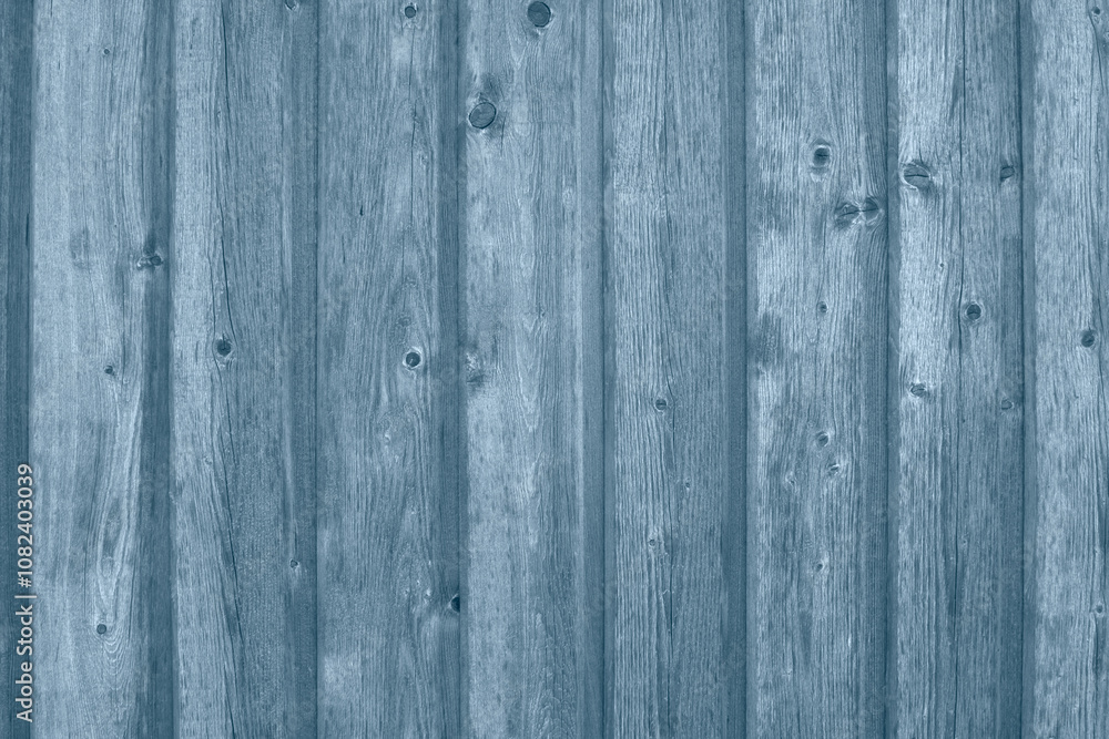 Naklejka premium Rough weathered wooden plank in a blue gray color