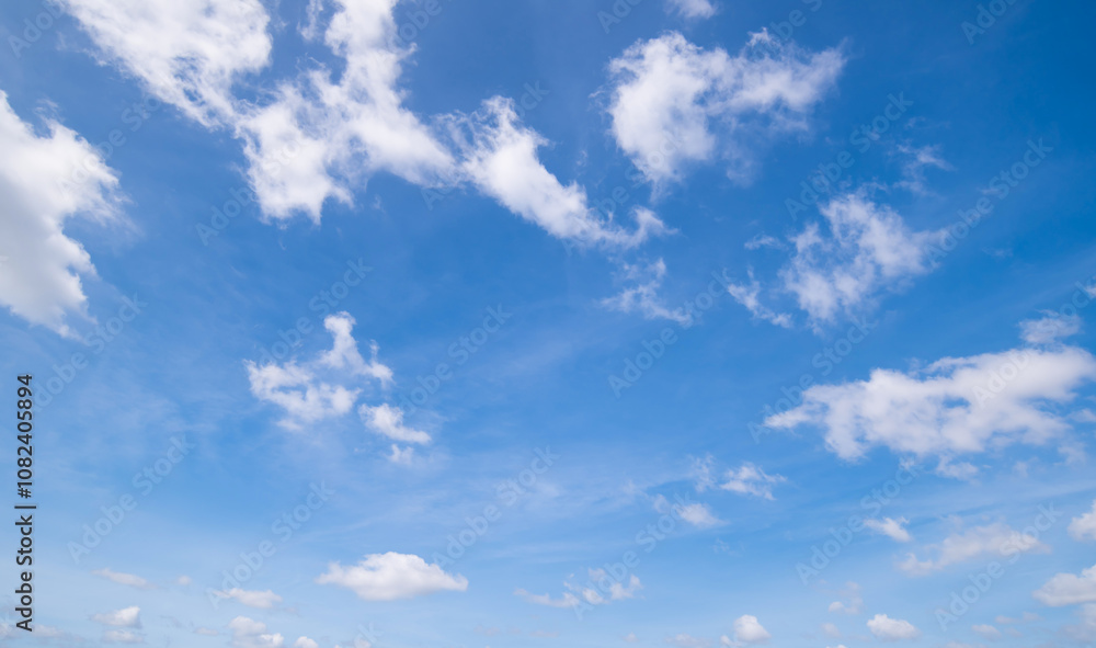 clear blue sky background,clouds with background, Blue sky background with tiny clouds. White fluffy clouds in the blue sky. clear blue sky background,clouds with background, Blue sky background with tiny clouds. White fluffy clouds in the blue sky.