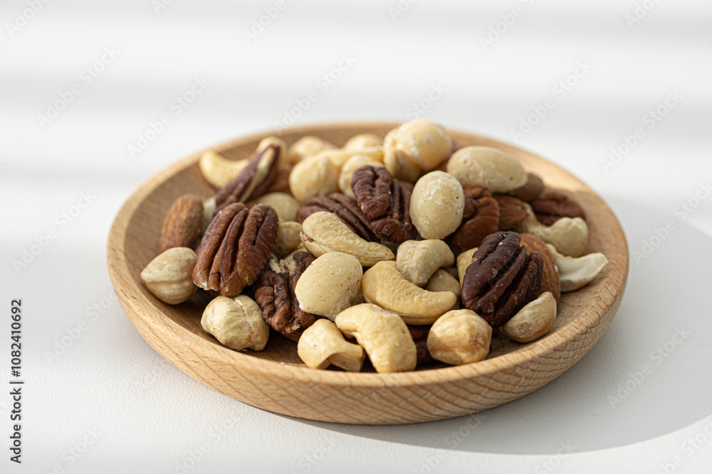 Pile of mixed nuts texture or background. Pile of mixed nuts texture or background.