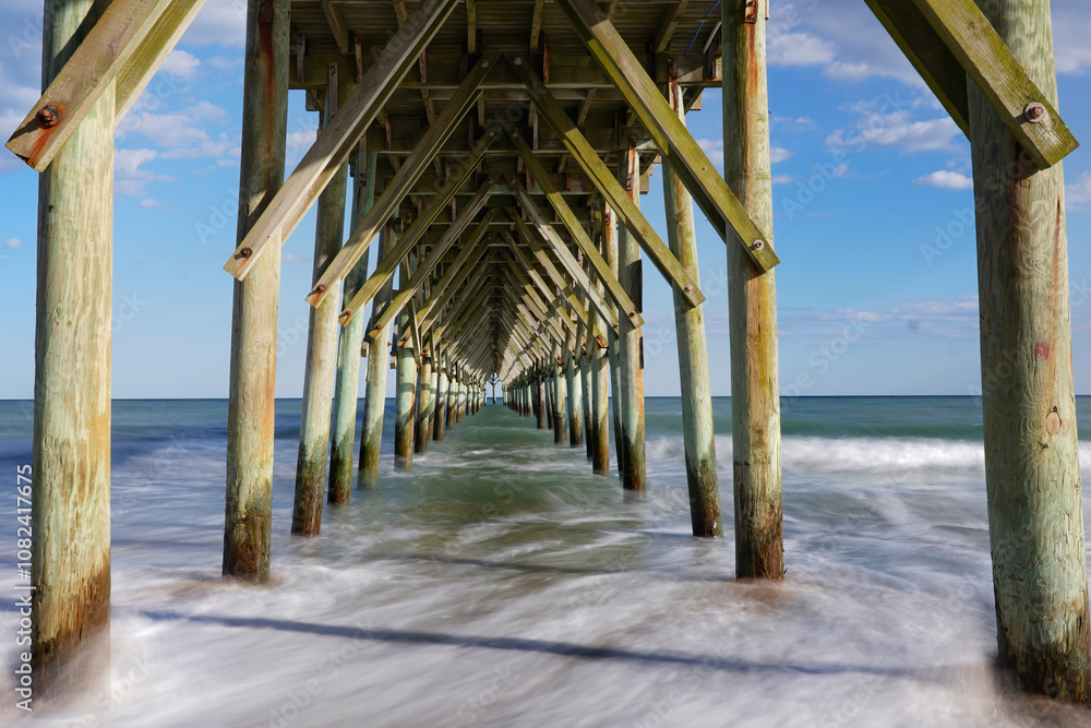 Long exposure of waves under the Surf City pier Long exposure of waves under the Surf City pier