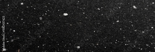 Abstract Texture of Black Surface with Random White Particles Ideal for Backgrounds, Designs, and Artistic Projects Emphasizing Depth and Contrast