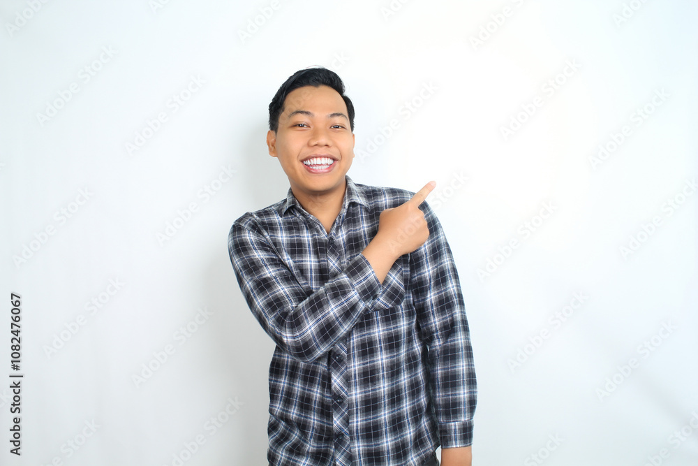 happy asian man pointing hand with smiling face and confident gesture isolated on white backgroun wearing plaid shirt happy asian man pointing hand with smiling face and confident gesture isolated on white backgroun wearing plaid shirt
