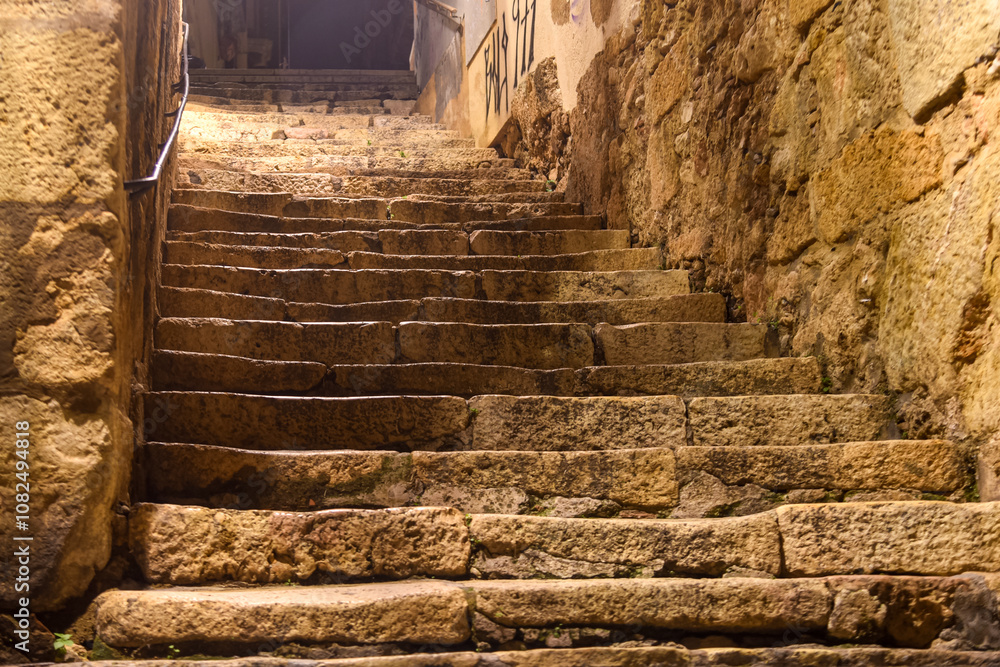 old stone stairs in the streets of the roman ancient city of Tarragona