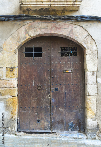 old vintage door in the streets of Tarragona, spain