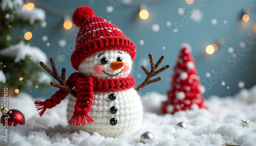 Charming crocheted snowman with a red hat and scarf, surrounded by festive decorations in a snowy setting copy space