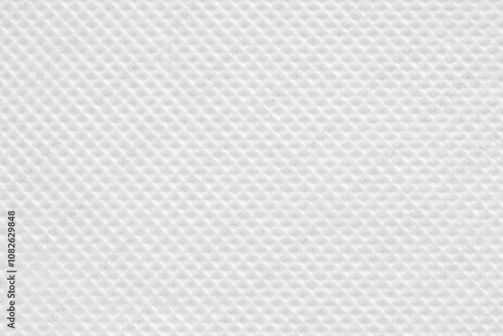 A sheet of clean tiled white tissue paper as background A sheet of clean tiled white tissue paper as background