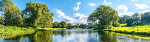 Serene River Tyne Landscape at Dusk with Calm Waters and Lush Greenery