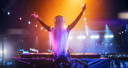 Photos Glamorous Pop DJ Artist Performing on Stage in Front of a Sold-Out Audience