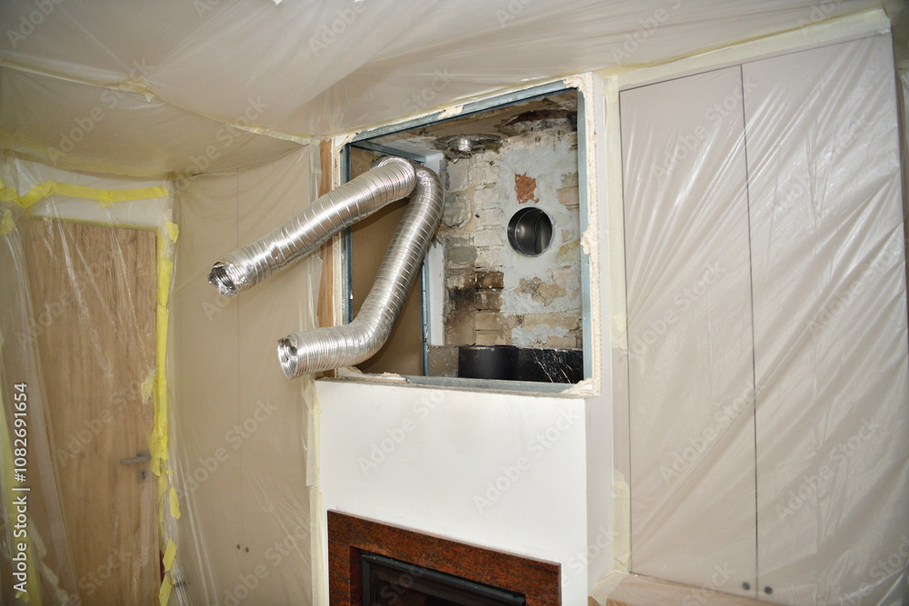 Repair of the fireplace insert and connection to the chimney in the house