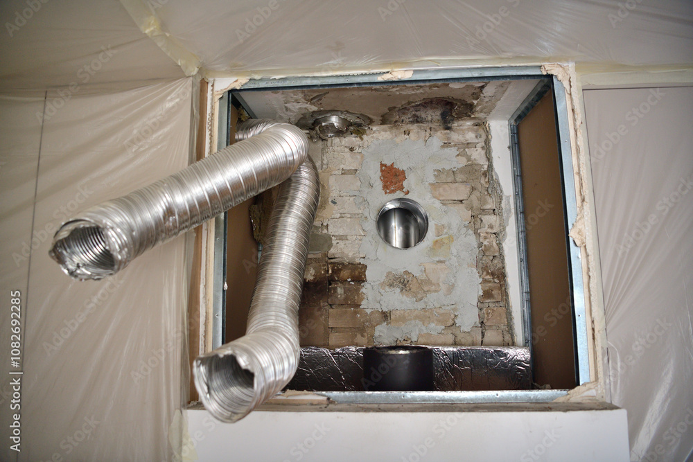 Repair of the fireplace insert and connection to the chimney in the house