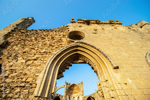 Arch detail and facade wall of historical Church of St. George the Exiler in the old town of Famagusta, Cyprus photo