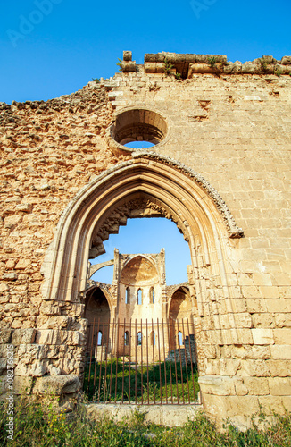 Arch detail and facade wall of historical Church of St. George the Exiler in the old town of Famagusta, Cyprus photo