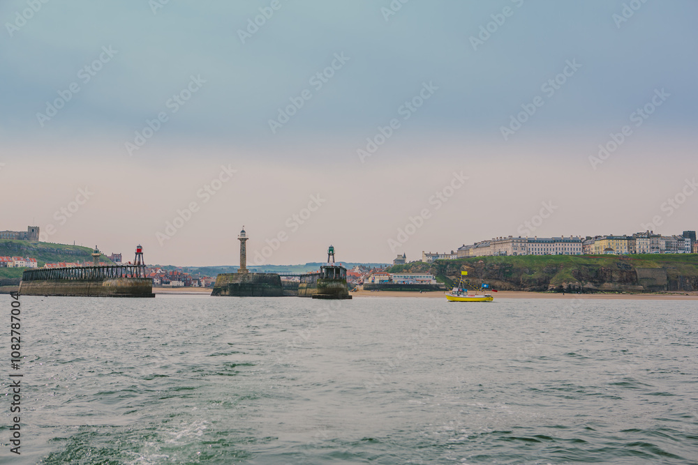 Stunning photos of Whitby, the iconic coastal town in North Yorkshire, England, known for its scenic Whitby harbour, river Esk, and picturesque coast. Stunning photos of Whitby, the iconic coastal town in North Yorkshire, England, known for its scenic Whitby harbour, river Esk, and picturesque coast.