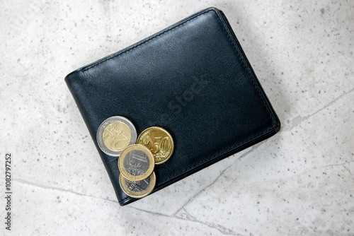 Leather partmone with money, coins and bills. Business concept. photo