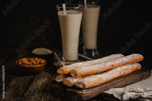 Fartons, typical sponge pastries of Valencia, Spain, made to be dipped in horchata or hot beverages like chocolate or coffee photo