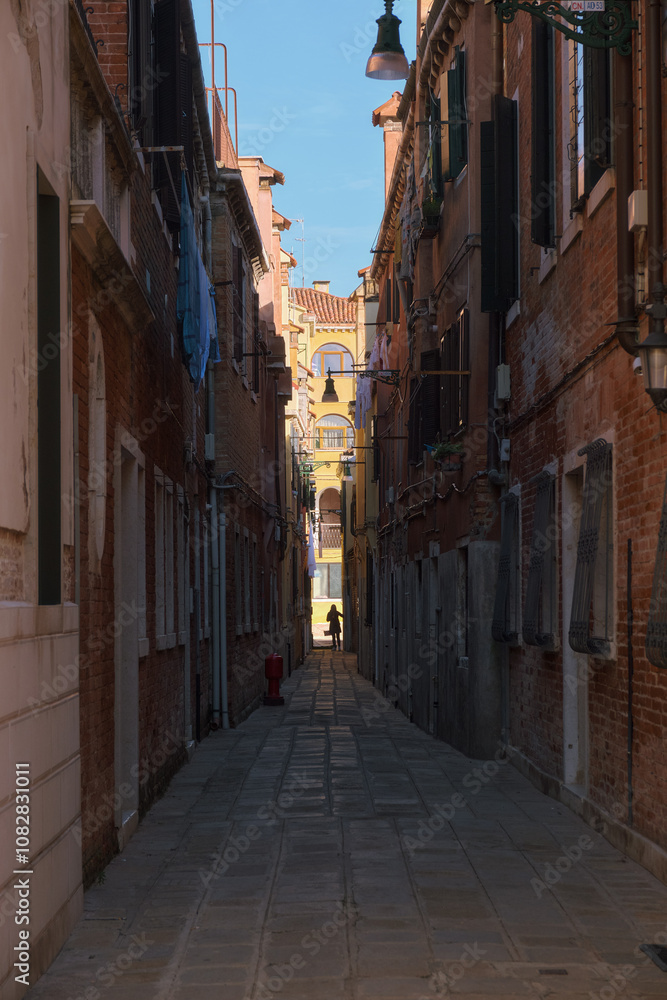Venetian street with vibrant architecture Venetian street with vibrant architecture
