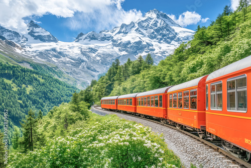 Train traveling through a picturesque mountain landscape, with snow-capped peaks and winding tracks