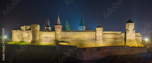Εκτύπωση καμβά panorama of castle with towers illumination in night twilight