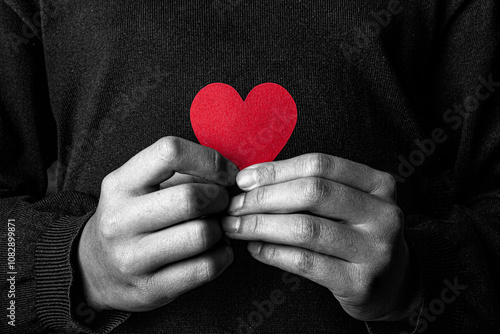 Young girl with a heart asking for help