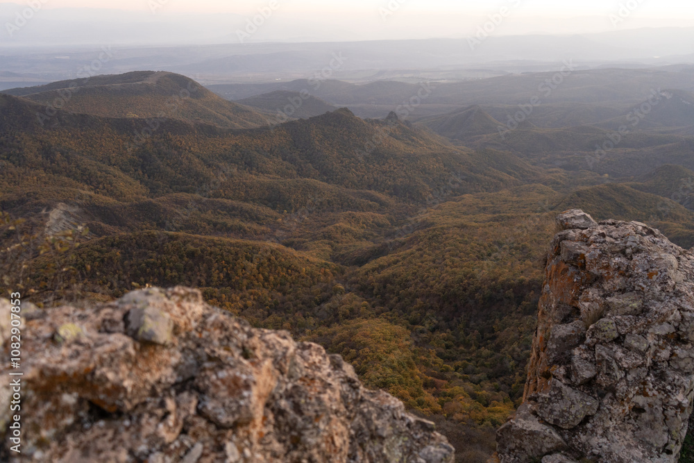 Fototapeta premium Autumn landscape of Georgia mountains in the evening after sunset