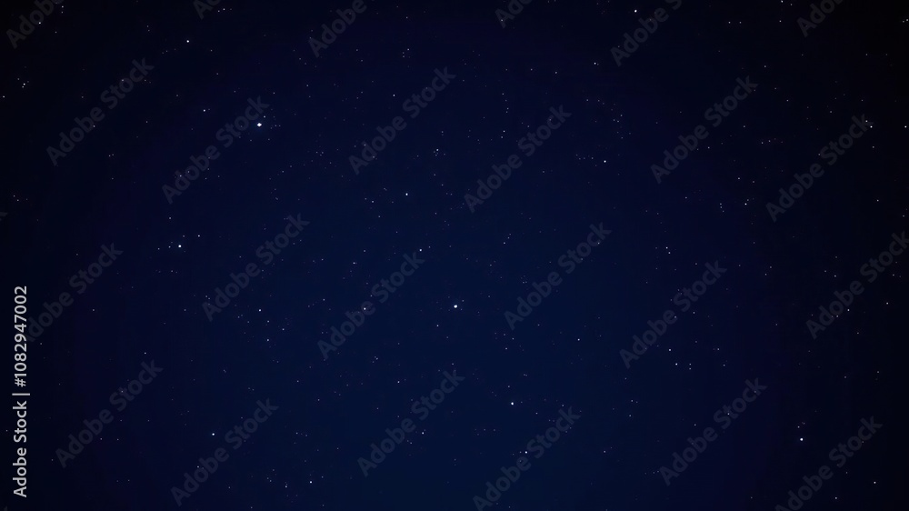 Fototapeta premium A serene starry night sky with a few scattered stars twinkling in the darkness of space, celestial body, dark matter, stellar explosion