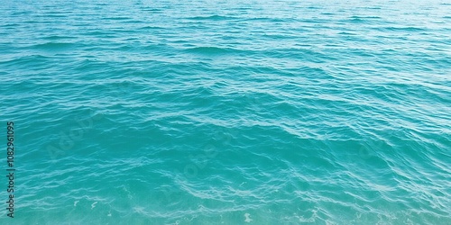 Blue water panorama background with gentle waves, tranquil ocean view, serene seascape, aquamarine water, peaceful beach scene, stock photo, seascape