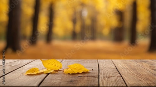 Obraz na płótnie Beautiful colorful natural autumn background for presentation. Fallen dry orange leaves on wooden boards against the backdrop of a blurry autumn park. w salonie