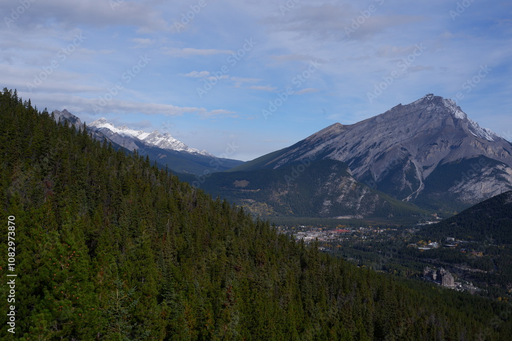 Obraz premium Photo of Cascade Mountain, Bow Valley, Bow River, Tunnel Mountain and town of Banff within Banff National Park in Alberta, Canada.