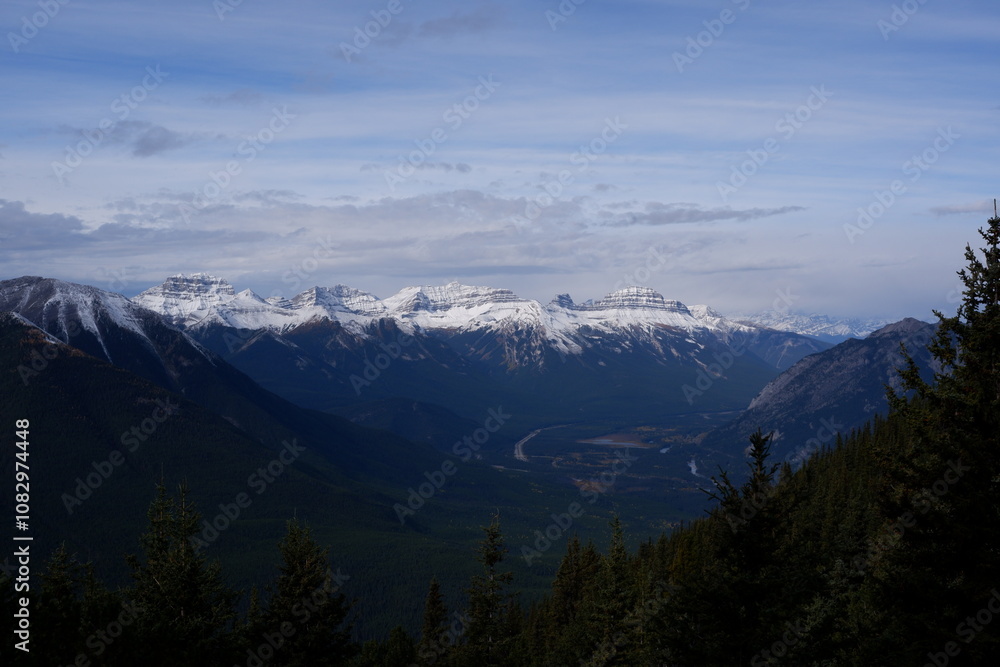 Fototapeta premium Photo of the Sundance Range with Mount Bourgeau, Mount Brett, Pilot Peak and Mount Temple in Banff National Park in Alberta, Canada.