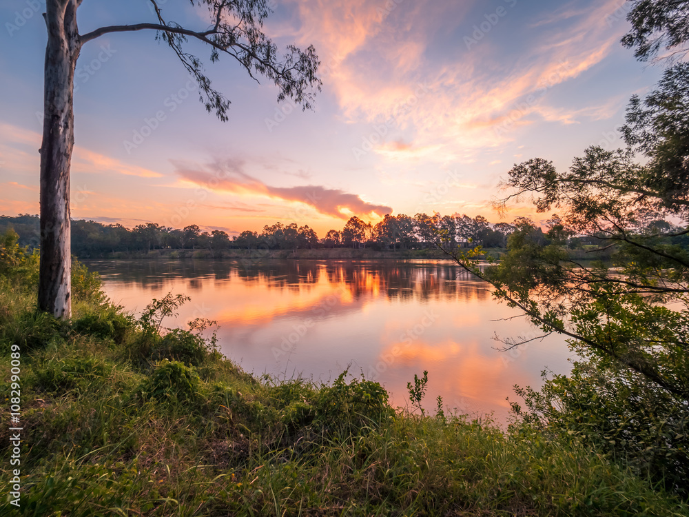 Obraz premium Sunset Over The River