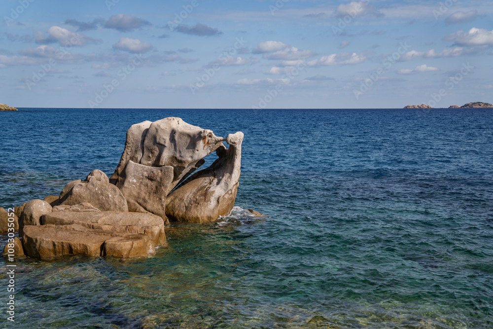 Fototapeta premium A rocky seaside with a beautiful water color