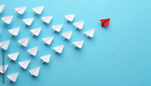 Free Download Red paper airplane flying against white ones, symbolizing individuality - GFXLoad