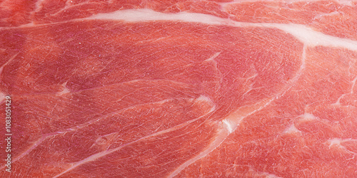 Hamon meat thin slice as macro photo background.