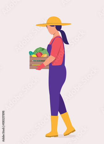 Side View Of A Young Woman With Hat, Rubber Boot And Glove Carrying A Wooden Crate Filled With Fresh Vegetable.