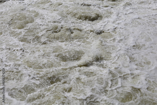 The threshold of the waterfall. The rushing water.